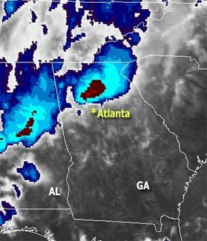 Satellite image taken Monday morning, September 21. Blues and Reds show the location of the heaviest rainfall when the image was taken.